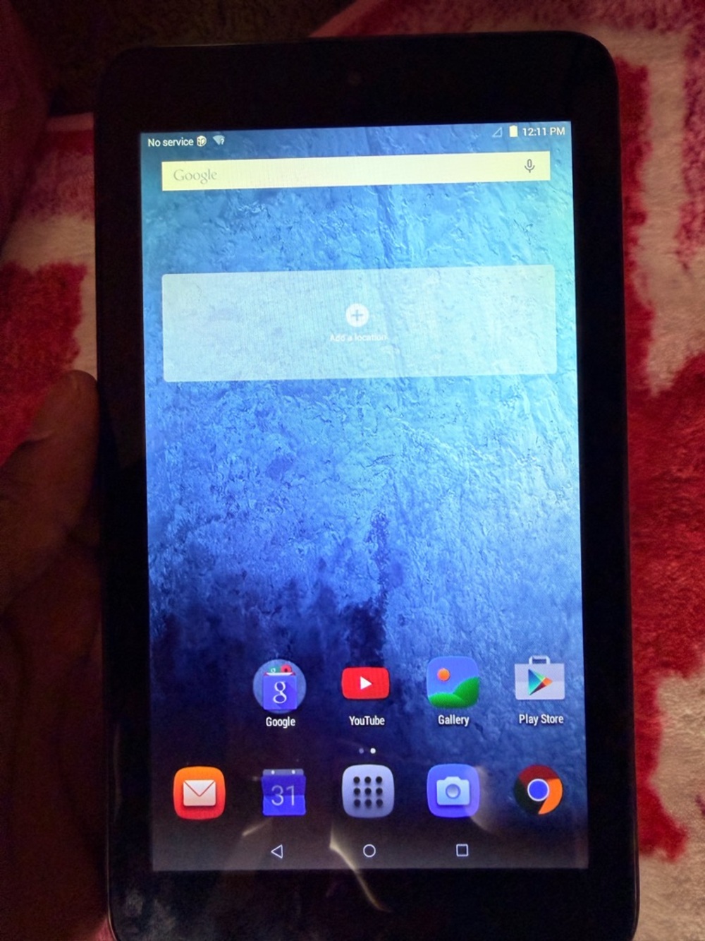 TCL Black Android Tablet with Blue Home Screen